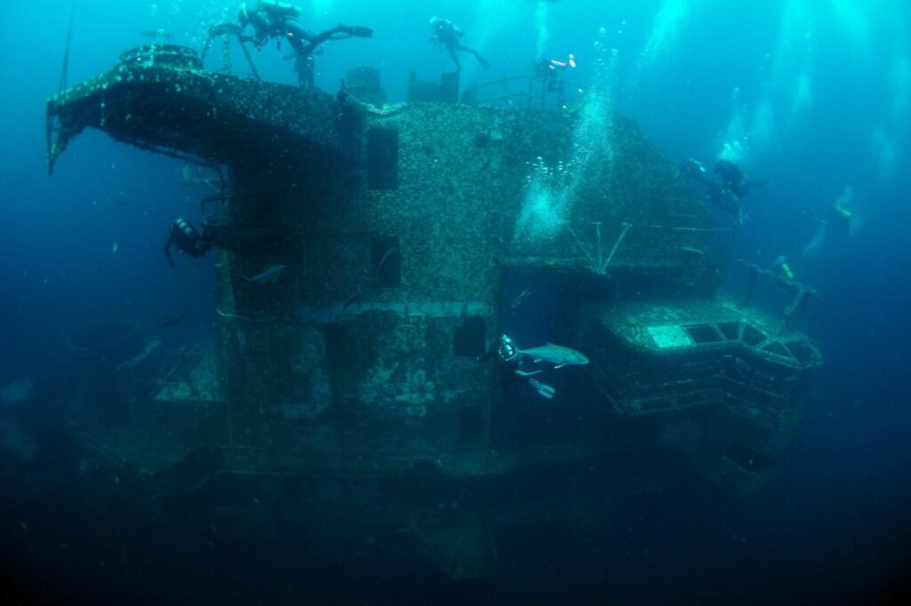 Divers explore the USS Oriskany's super-structure